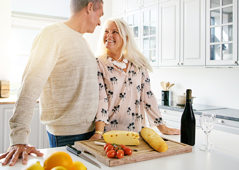 Couple discussing how cheese prevents tooth decay